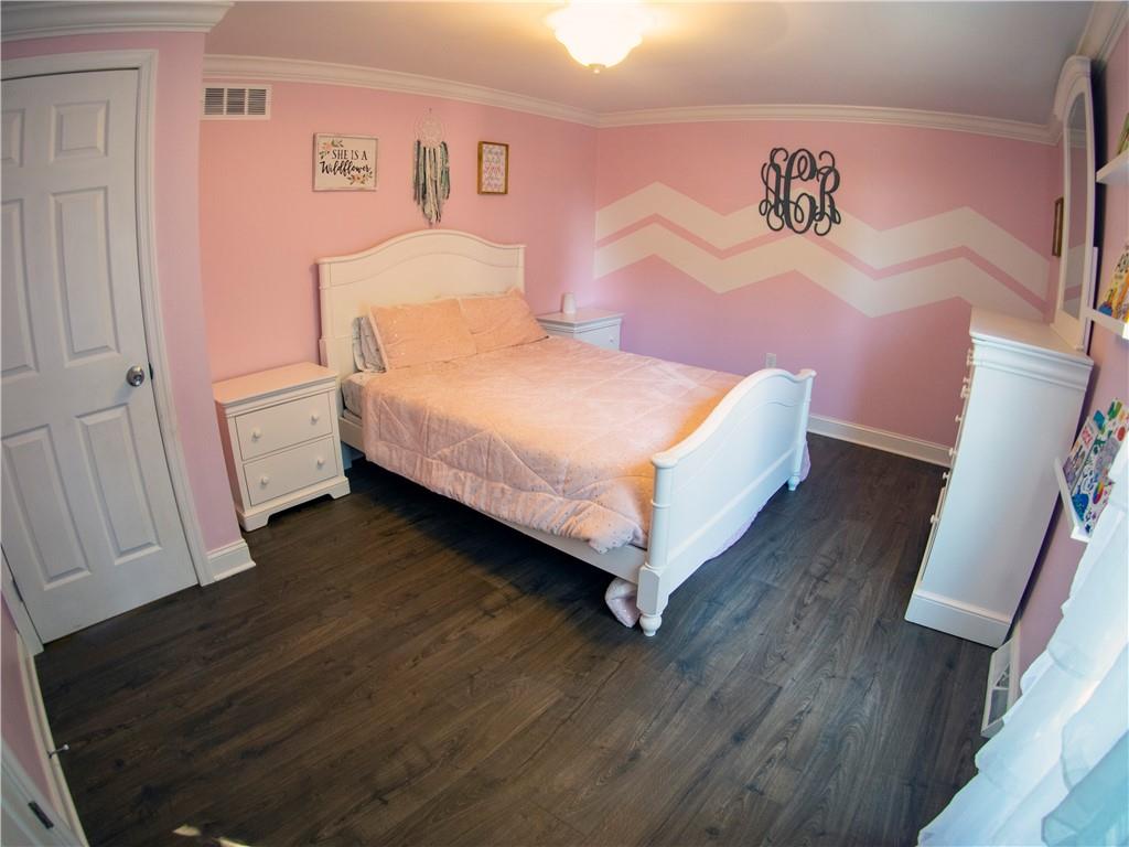102 Bertley Ridge Drive Coraopolis, PA 15108 - Photo 14 of 25 a bedroom with a bed and a desk