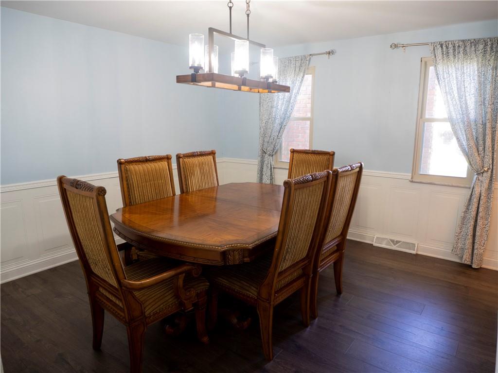 102 Bertley Ridge Drive Coraopolis, PA 15108 - Photo 8 of 25 a view of a dining room with furniture window and wooden floor