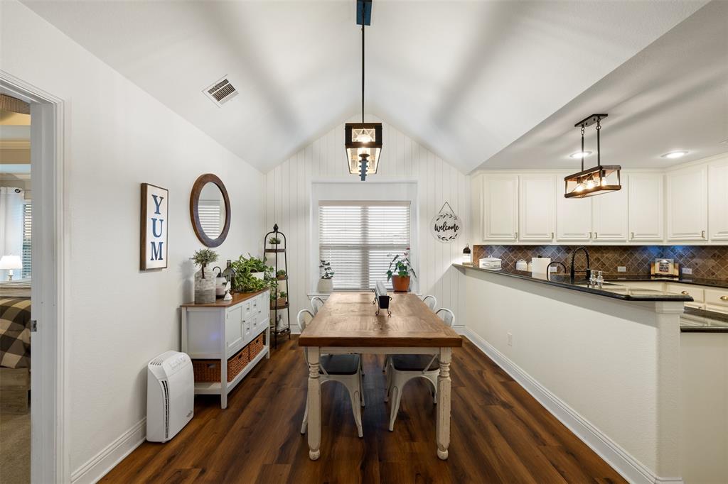 5200 Medallion Court Midlothian, TX 76065 - Photo 15 of 40 Dining area with new shiplap wall, fresh paint, and light fixtures.