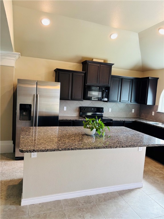 7522 Ranch View Drive Corpus Christi, TX 78414 - Photo 3 of 17 a kitchen with stainless steel appliances granite countertop a sink a stove and a microwave with wooden floor