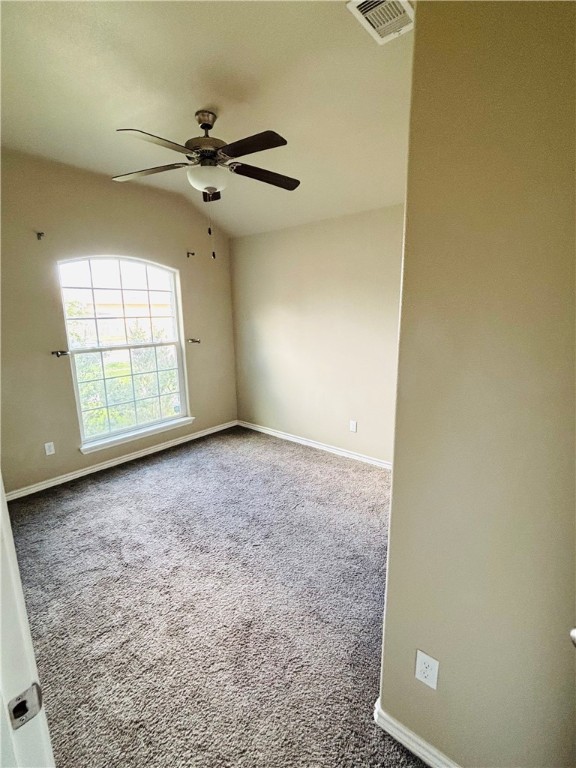 7522 Ranch View Drive Corpus Christi, TX 78414 - Photo 7 of 17 an empty room with windows and ceiling fan view