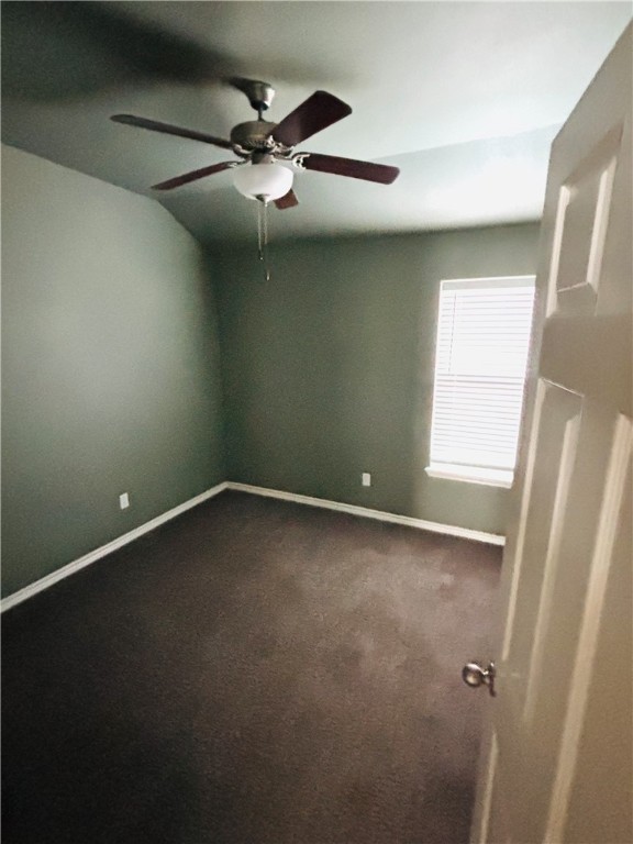 7522 Ranch View Drive Corpus Christi, TX 78414 - Photo 10 of 17 en empty room with windows and fan