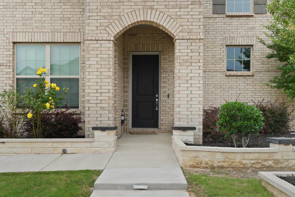 3533 Hyacinth Way Prosper, TX 75078 - Photo 4 of 38 a front view of a house with a yard