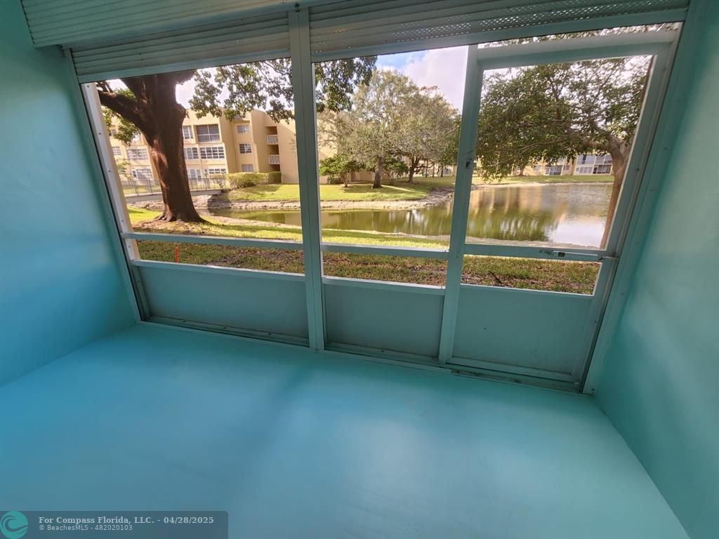 5851 Northwest 62nd Avenue, Unit 105 Tamarac, FL 33319 - Photo 12 of 18 a view of a room with window