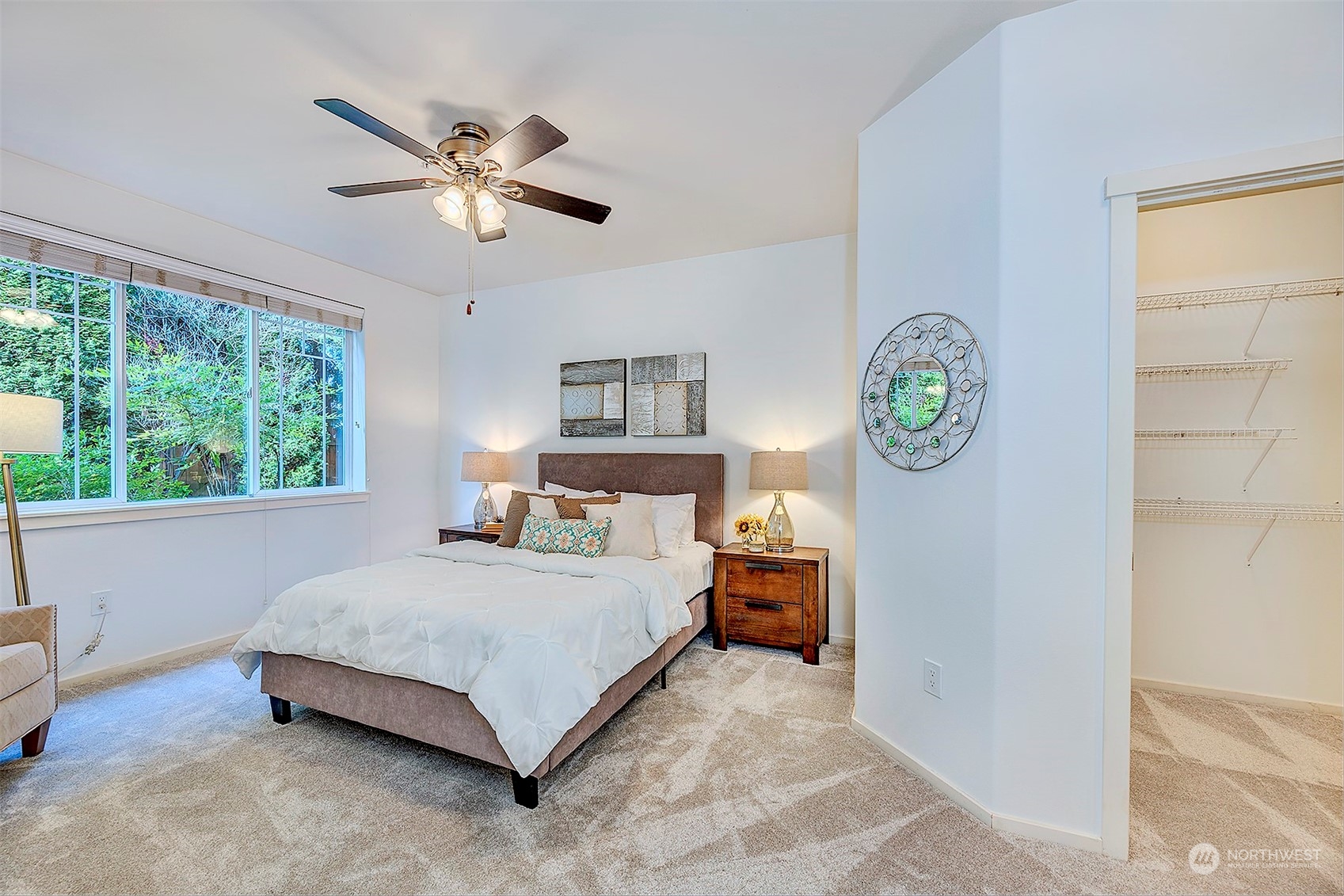 555 Anacortes Court Northeast, Unit 101 Renton, WA 98059 - Photo 14 of 22 a bedroom with a bed and window