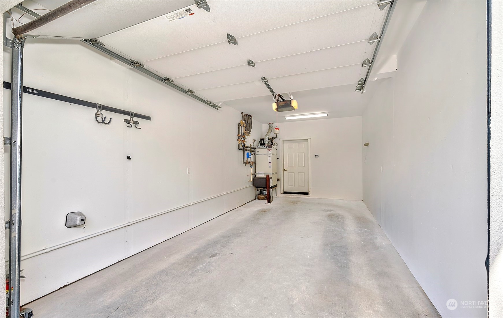 555 Anacortes Court Northeast, Unit 101 Renton, WA 98059 - Photo 20 of 22 a view of a garage