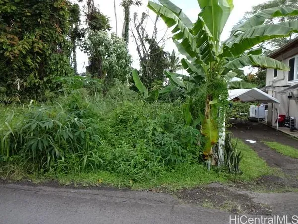 a view of houses with yard