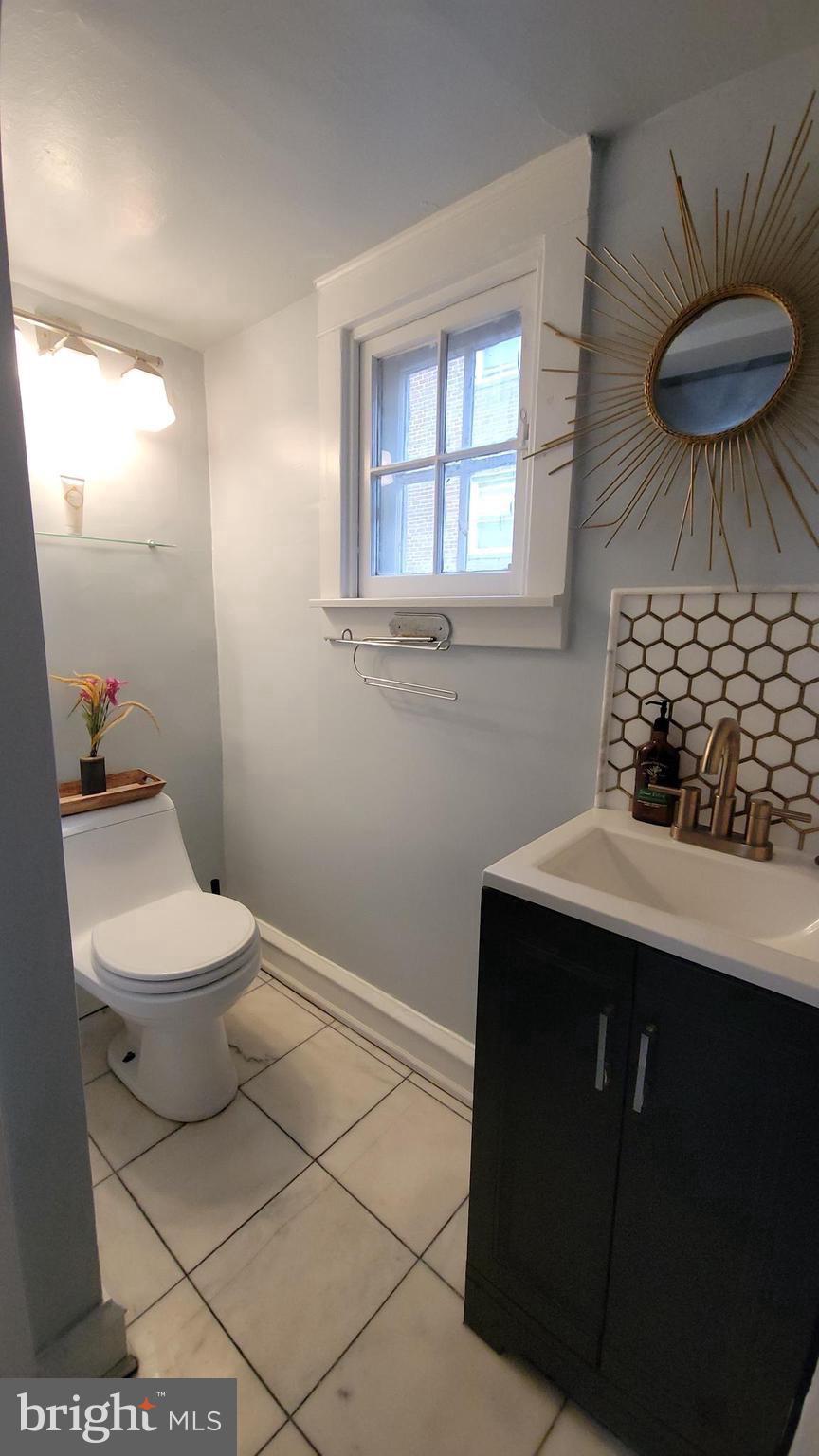 1806 Garrett Road Lansdowne, PA 19050 - Photo 11 of 25 a bathroom with a toilet and a sink