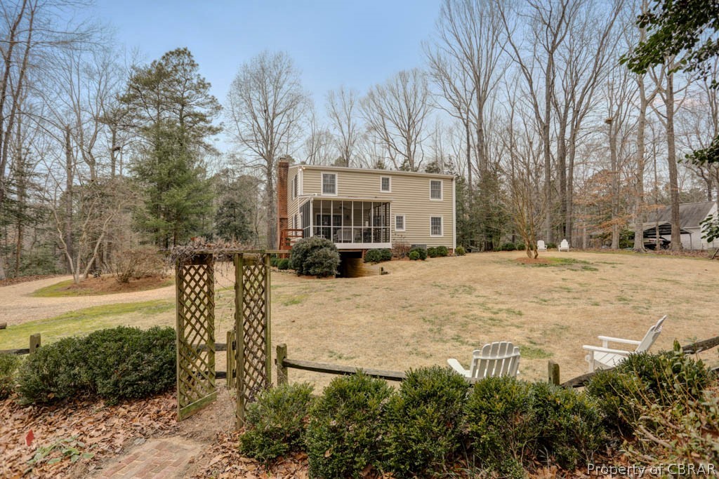 6033 Seldon Pond Road Gloucester, VA 23061 - Photo 46 of 49 Large back yard. Wait until you see the Zoysia grass come alive! The garden area also features 100 year old original colonial pavers.