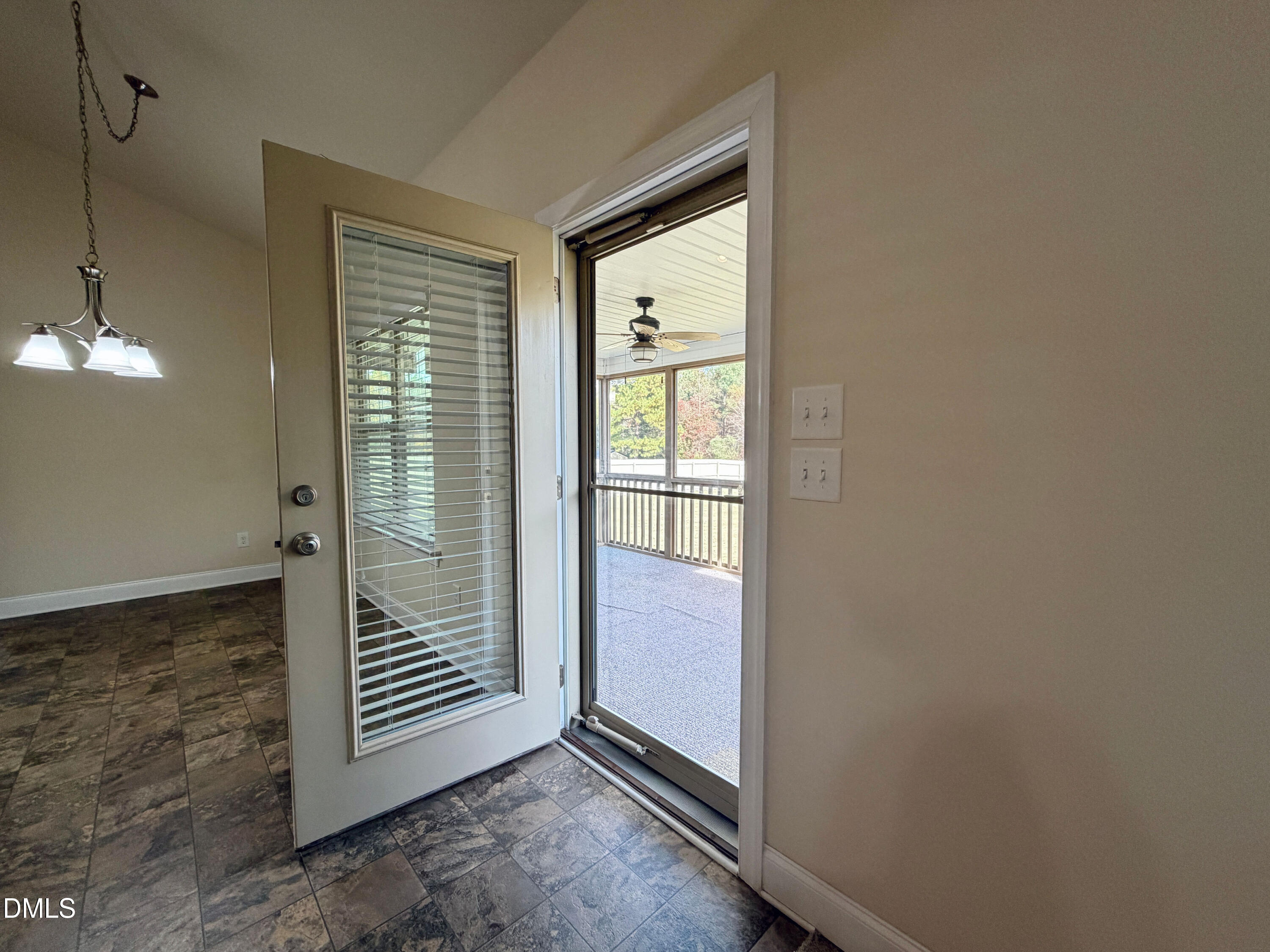 15 Cedar Falls Way Angier, NC 27501 - Photo 15 of 56 a view of empty room with floor to ceiling window