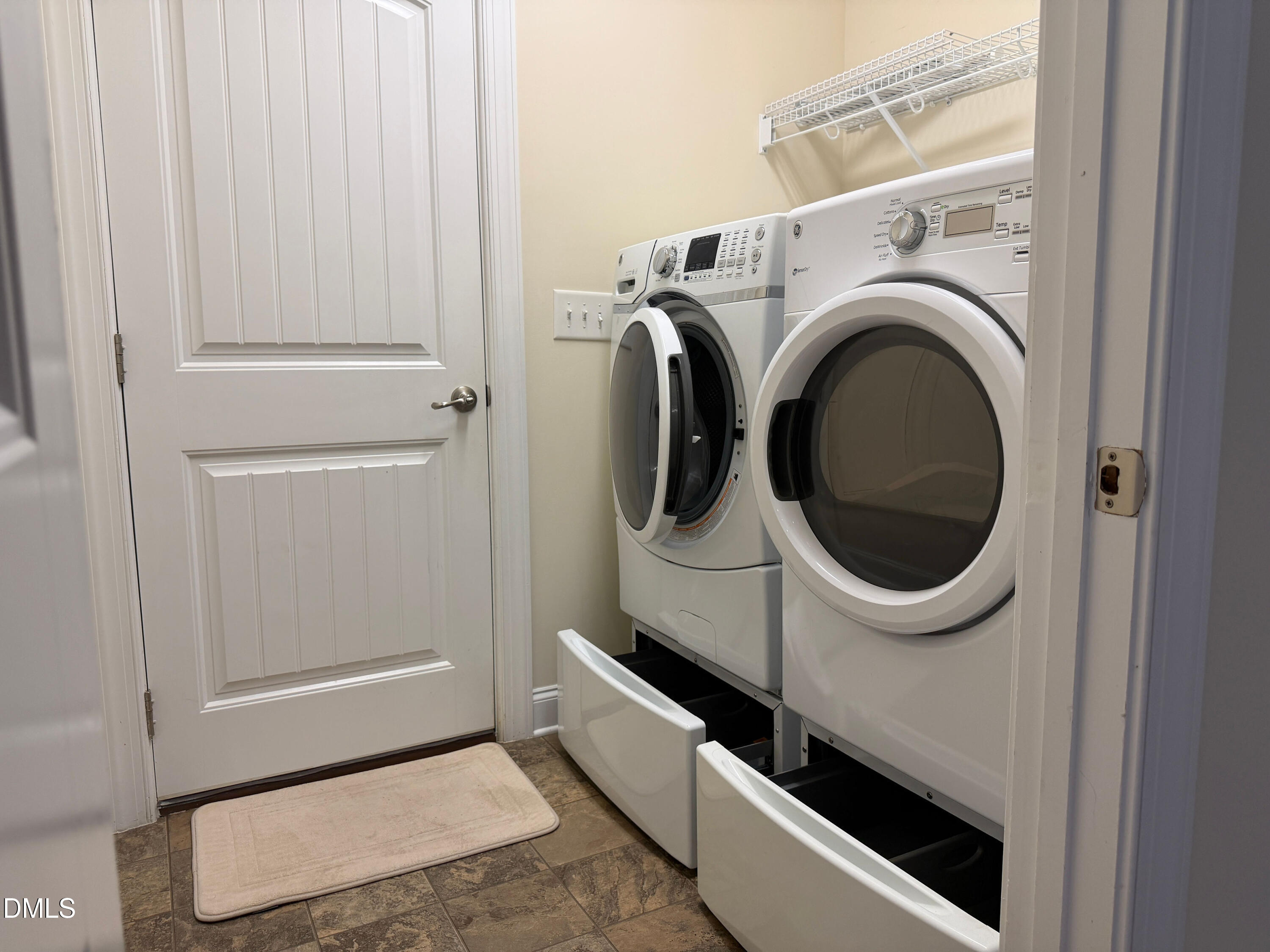 15 Cedar Falls Way Angier, NC 27501 - Photo 17 of 56 a utility room with dryer and washer