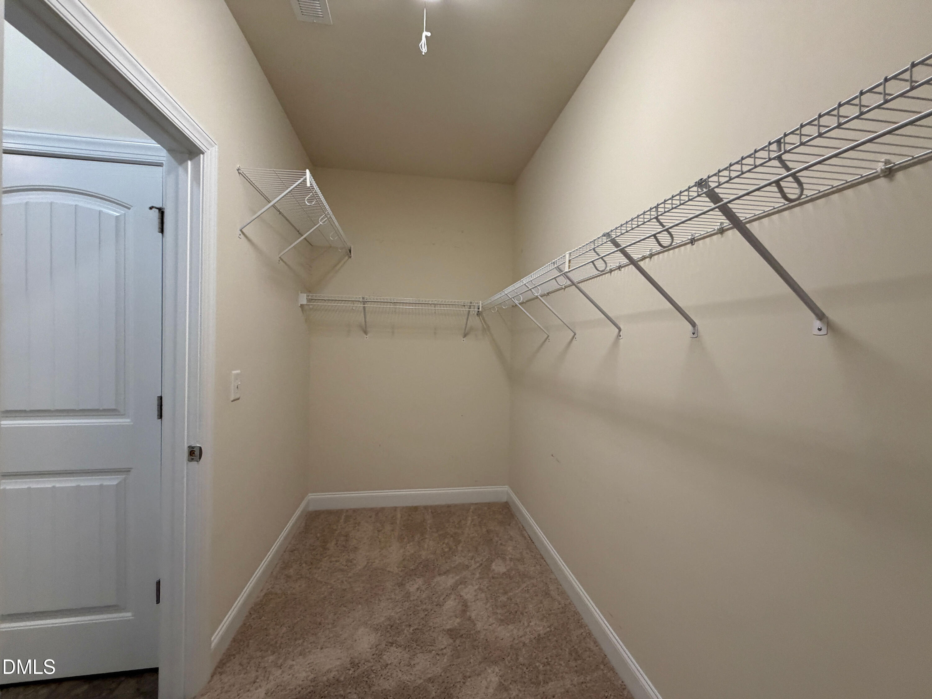 15 Cedar Falls Way Angier, NC 27501 - Photo 27 of 56 a view of a room with racks on the wall