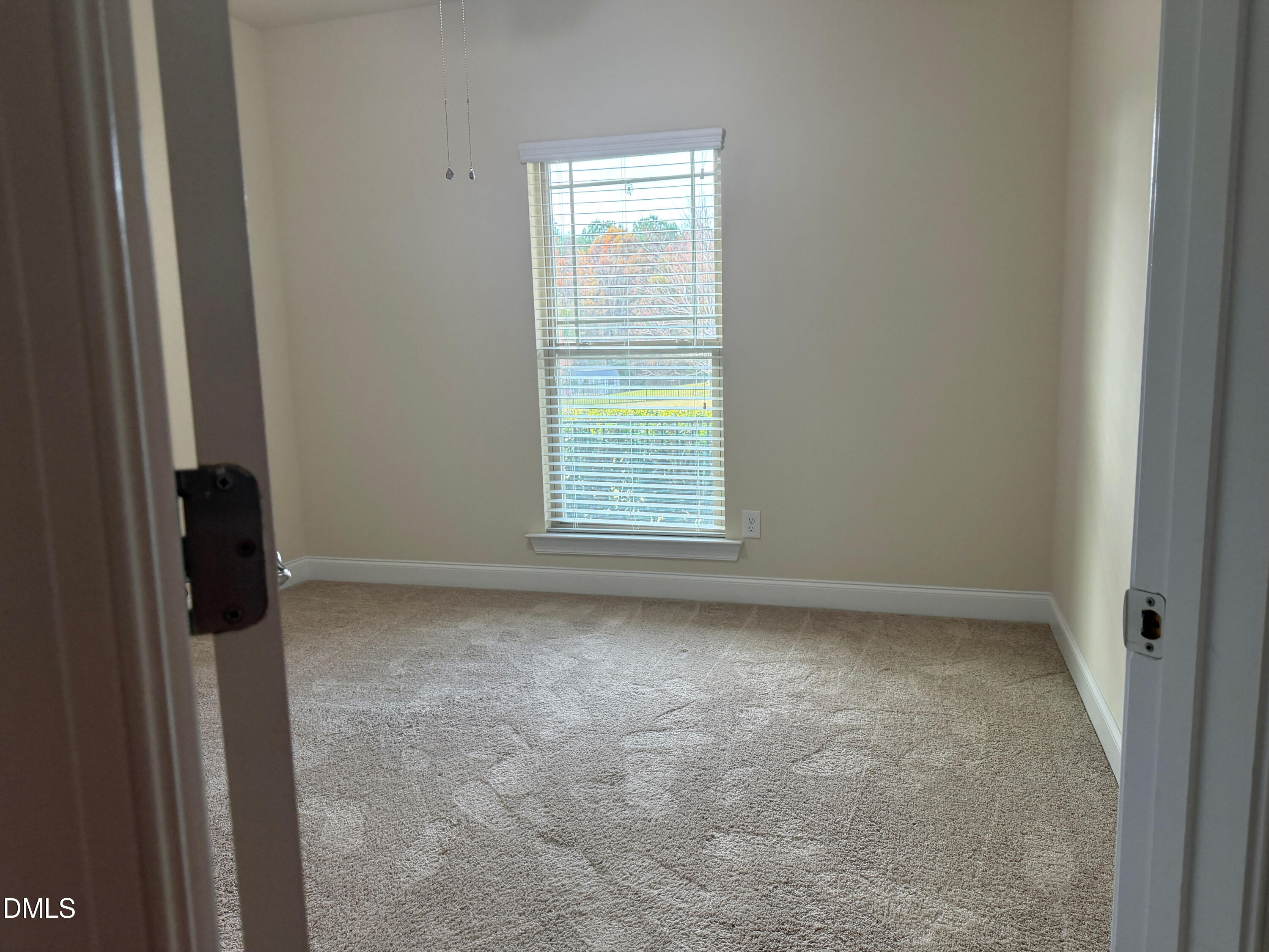 15 Cedar Falls Way Angier, NC 27501 - Photo 33 of 56 a view of a room that has a window in it
