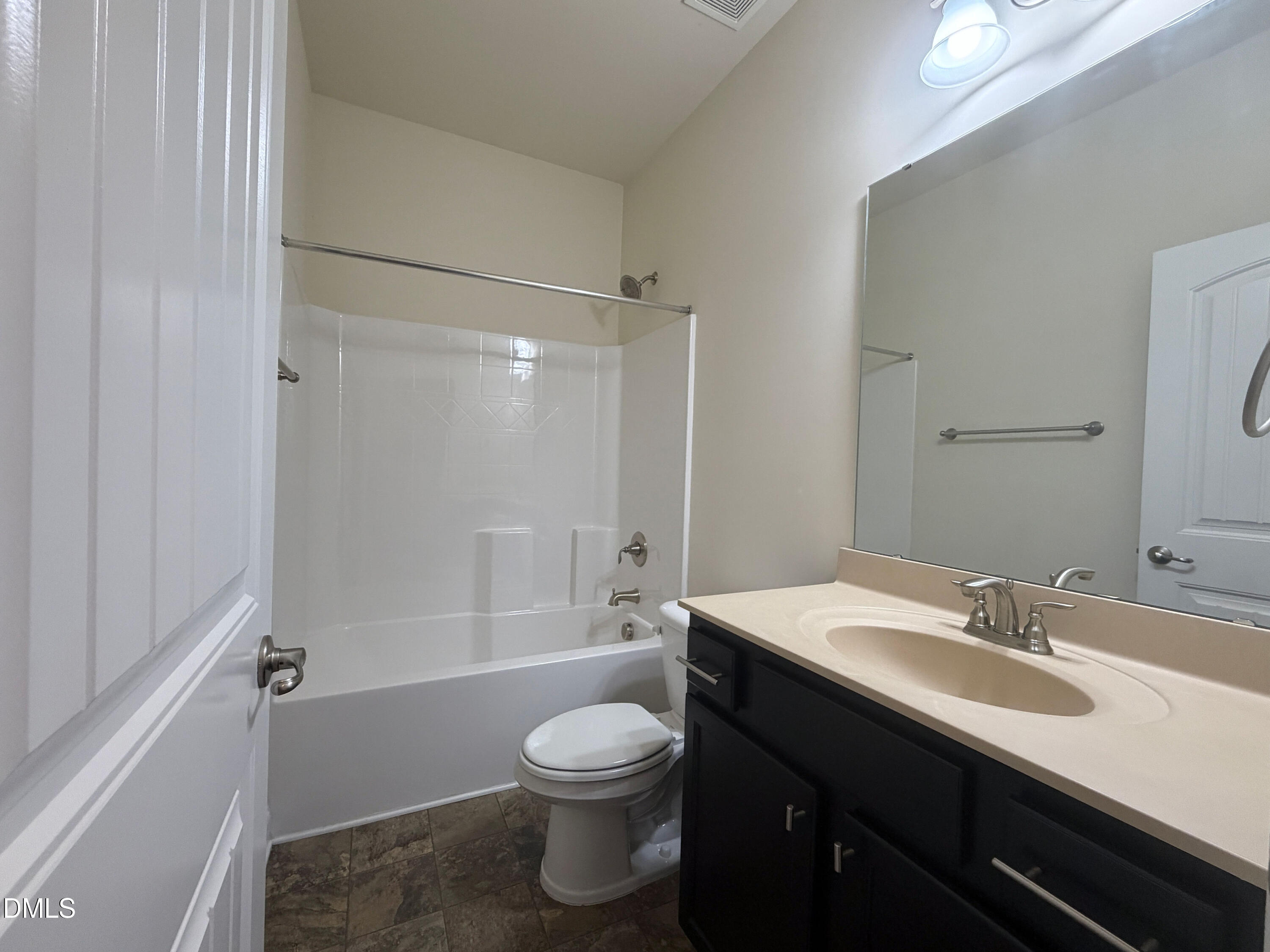15 Cedar Falls Way Angier, NC 27501 - Photo 36 of 56 a bathroom with a sink a toilet and shower