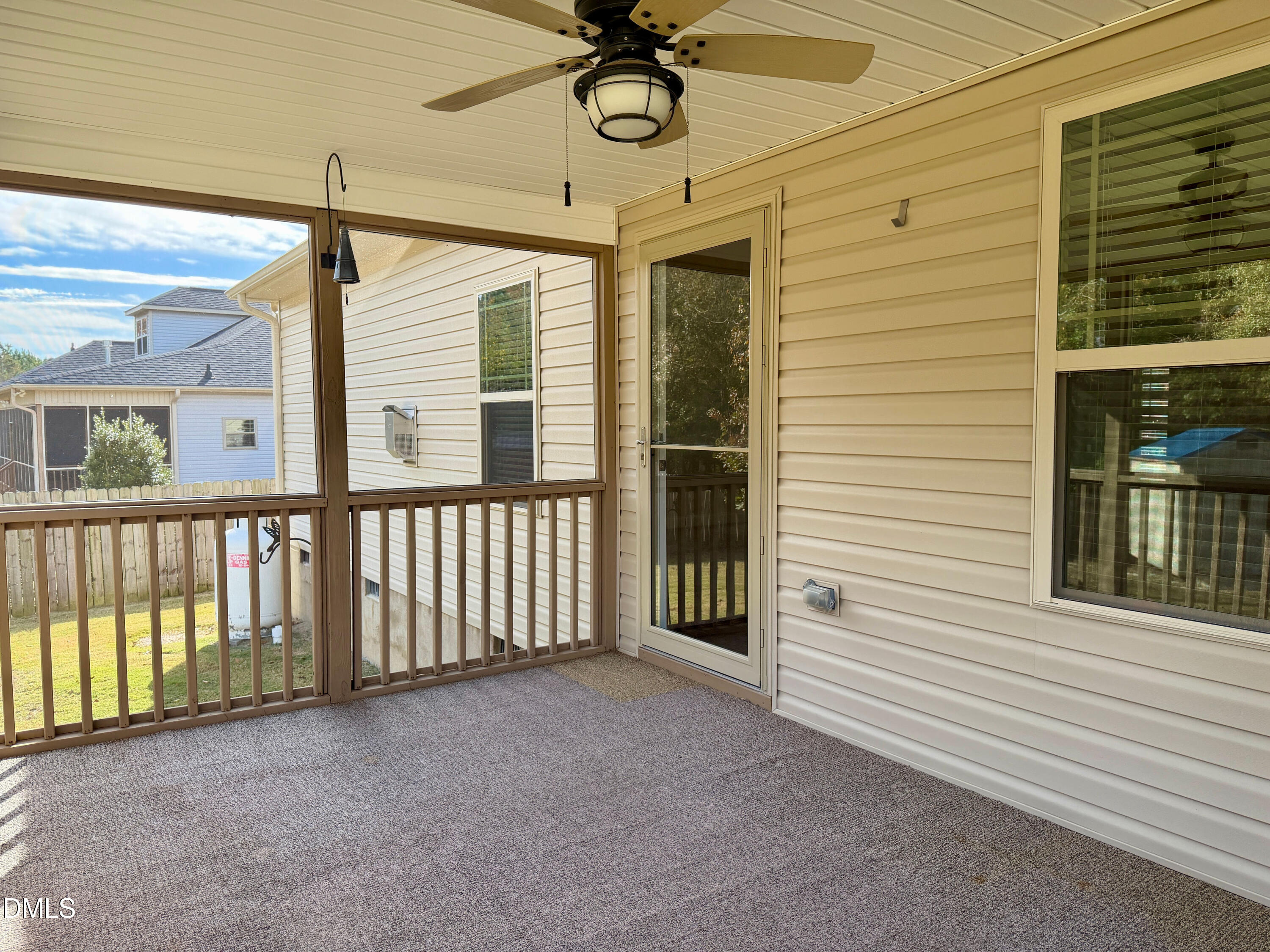 15 Cedar Falls Way Angier, NC 27501 - Photo 37 of 56 a view of a porch with a table and chairs
