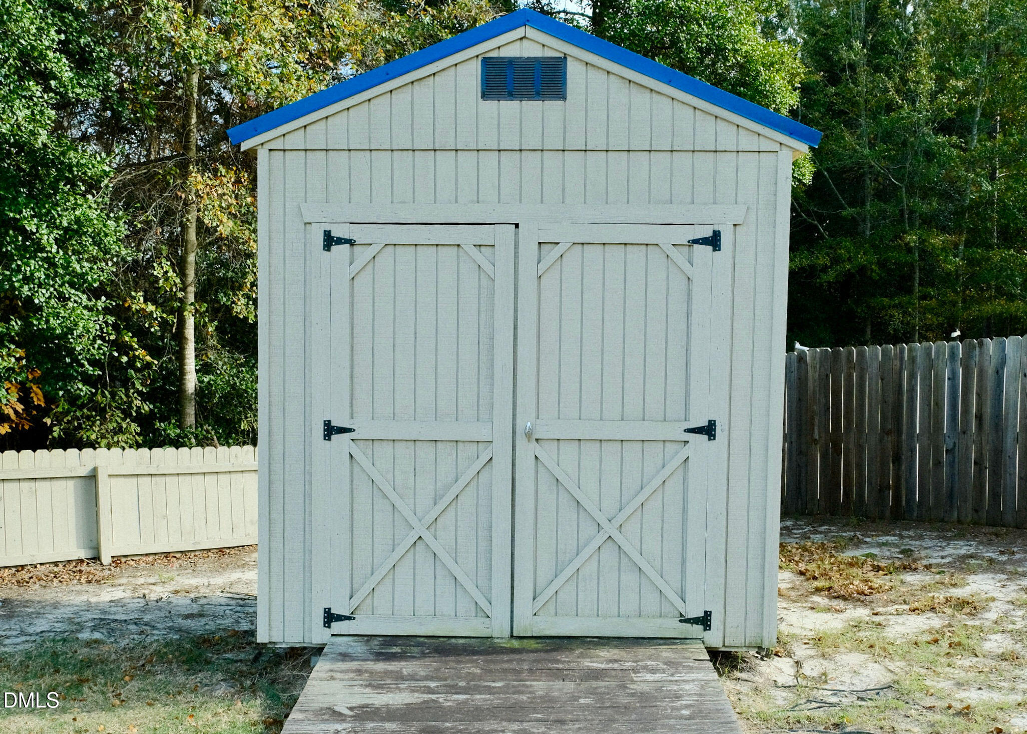 15 Cedar Falls Way Angier, NC 27501 - Photo 46 of 56 a view of small wooden house with a small yard