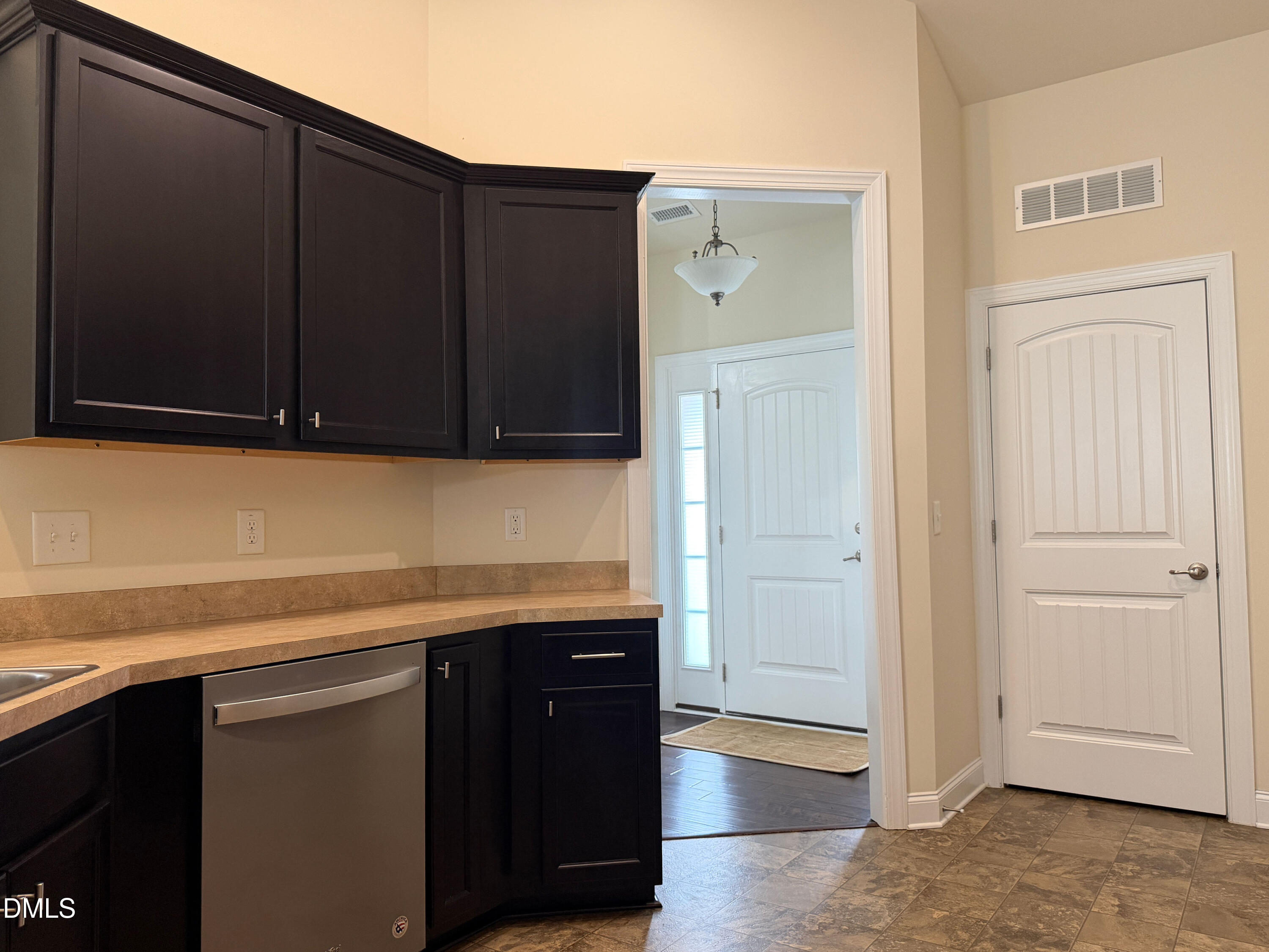 15 Cedar Falls Way Angier, NC 27501 - Photo 8 of 56 a kitchen with a sink and cabinets