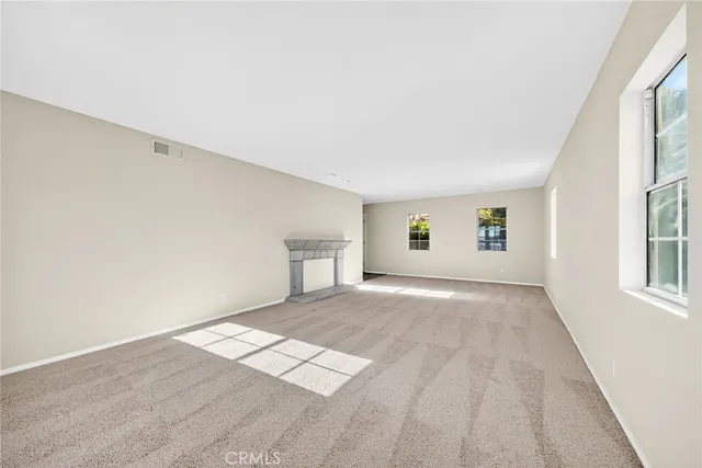 a bathroom with a toilet sink and vanity