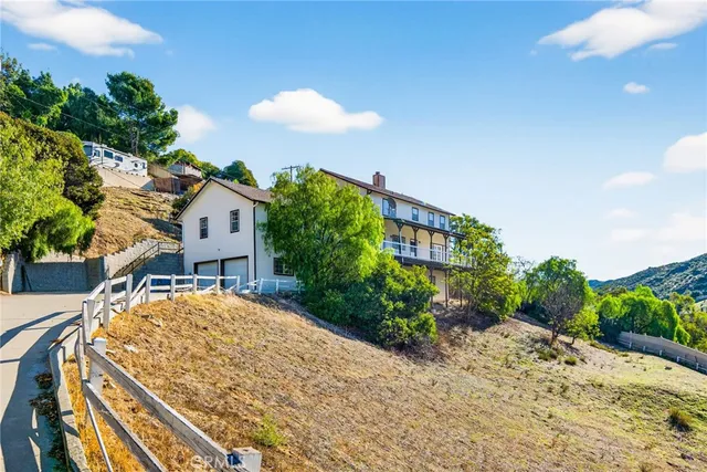 a view of balcony with furniture and outdoor space