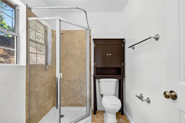 a view of room with window and closet