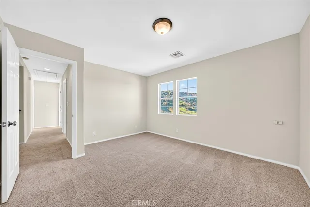 a view of a chairs and table in backyard