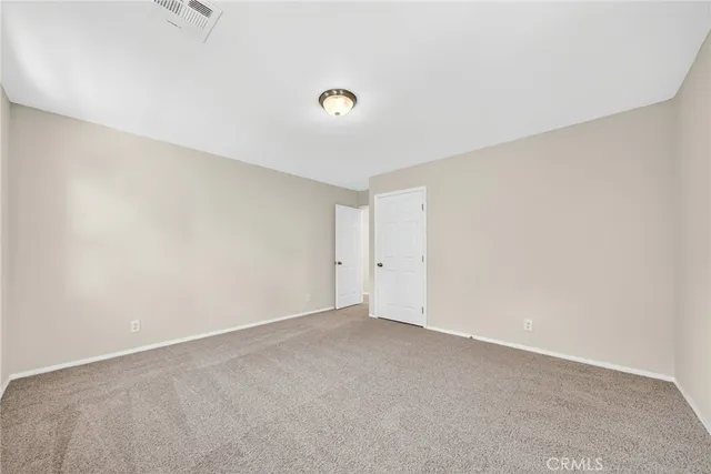 a view of a house with a tree