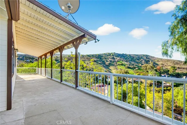 a view of a livingroom with an empty space and a window
