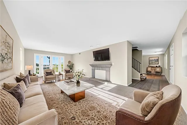a kitchen with white cabinets and appliances