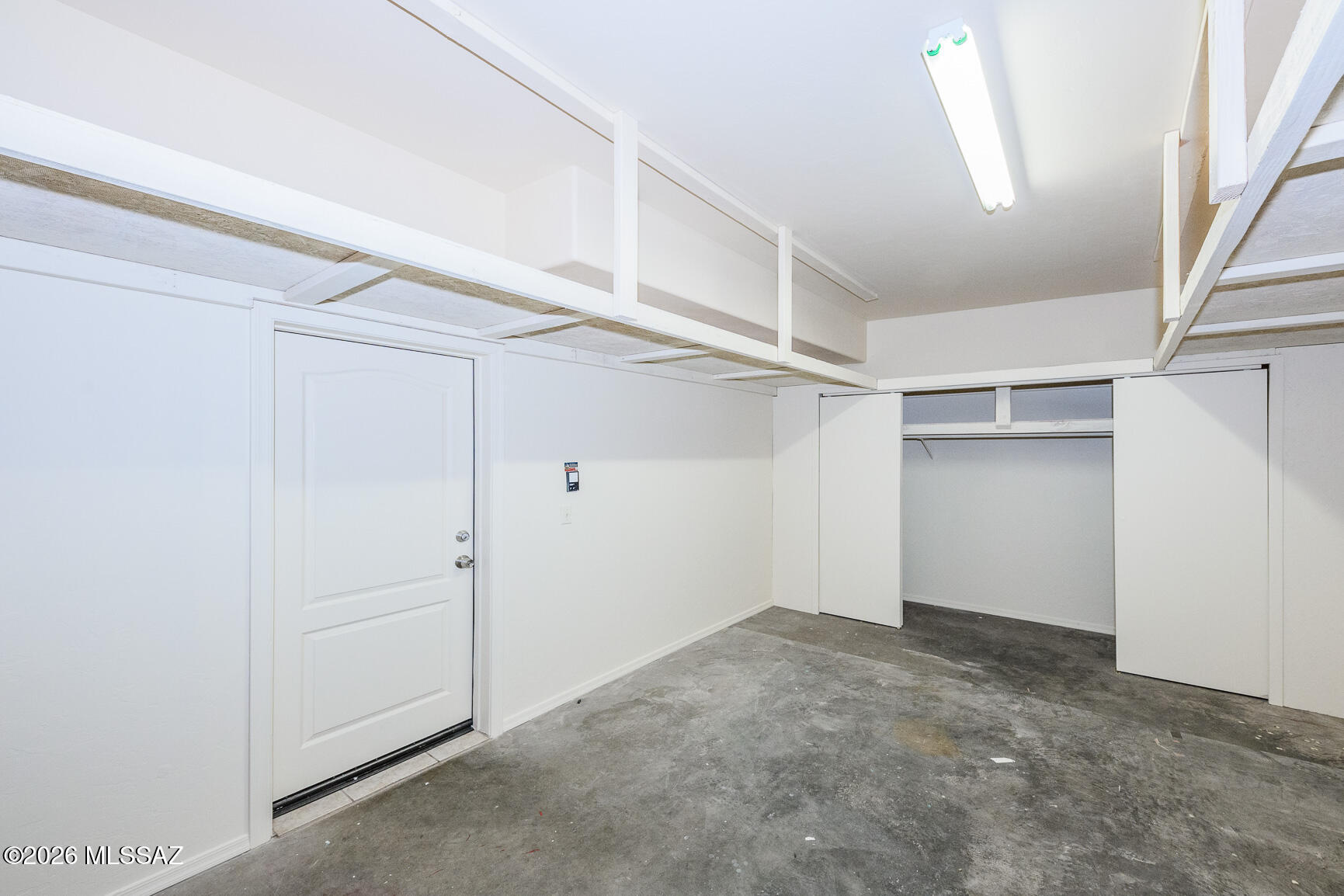 13588 East High Plains Ranch Street Vail, AZ 85641 - Photo 31 of 44 Tandem 3 car garage with closet