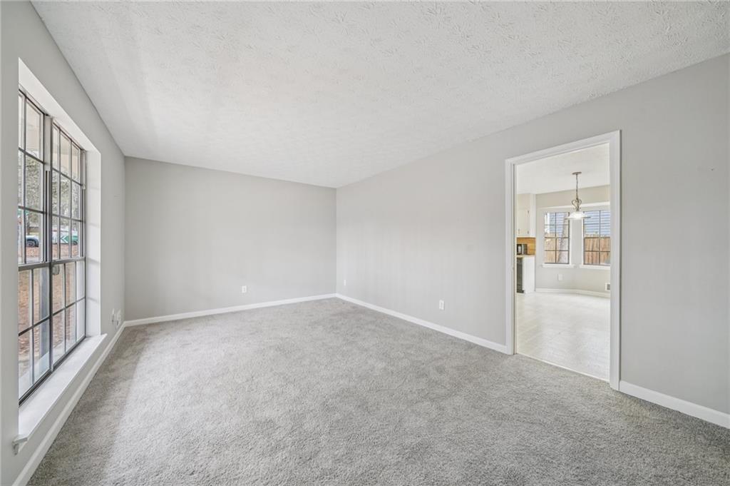 337 Independence Drive Jonesboro, GA 30238 - Photo 14 of 41 an empty room with windows