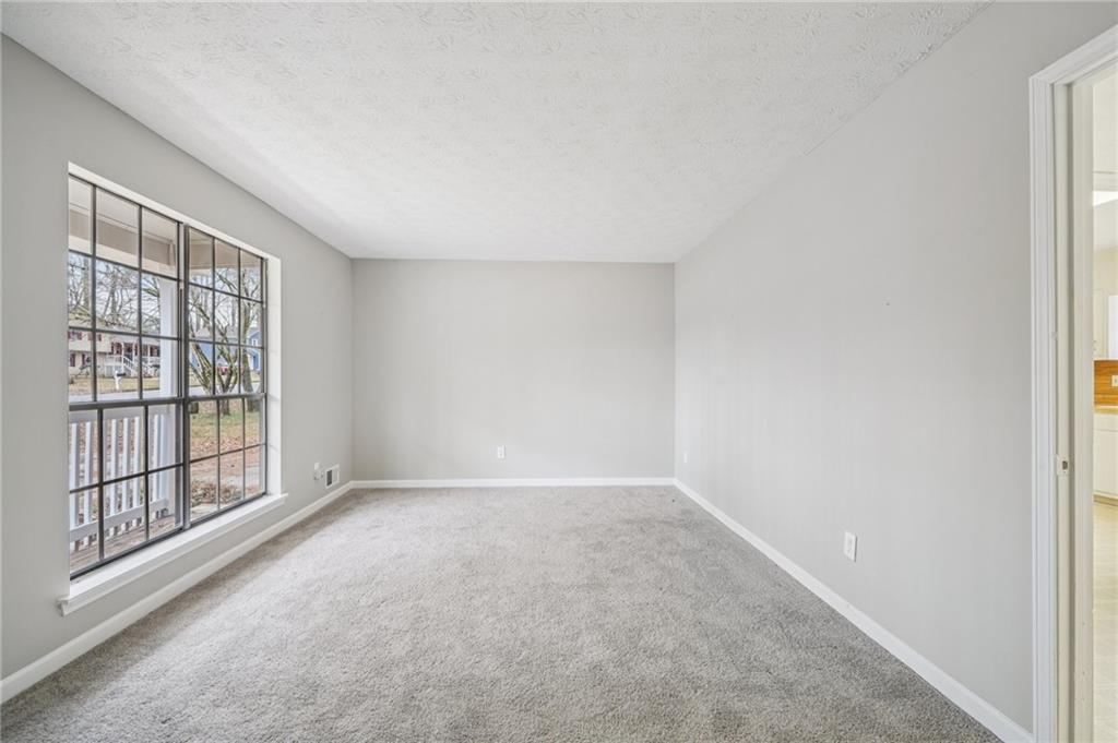 337 Independence Drive Jonesboro, GA 30238 - Photo 15 of 41 an empty room with windows