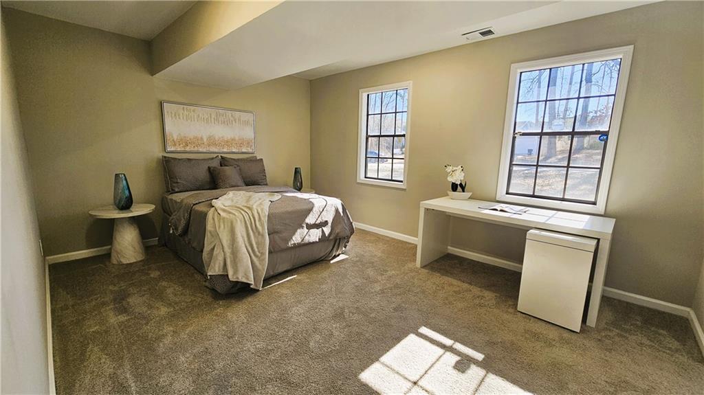 337 Independence Drive Jonesboro, GA 30238 - Photo 19 of 41 a bed room with a bed and a window