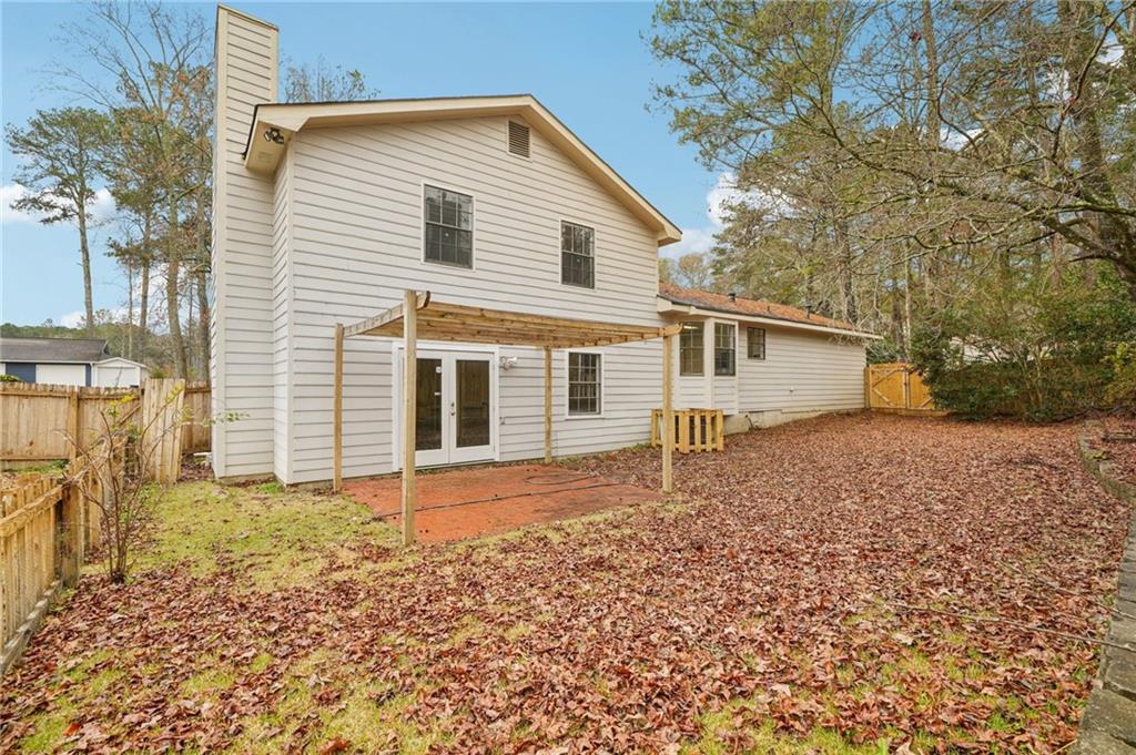 337 Independence Drive Jonesboro, GA 30238 - Photo 28 of 41 a view of a house with a yard