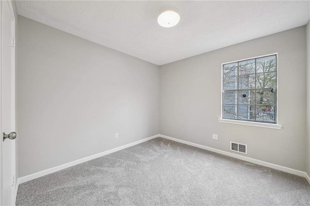 337 Independence Drive Jonesboro, GA 30238 - Photo 30 of 41 an empty room with a window