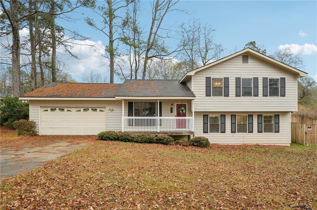337 Independence Drive Jonesboro, GA 30238 - Photo 5 of 41 a front view of a house with a yard