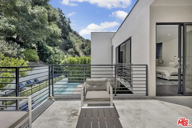 a house view with a outdoor space