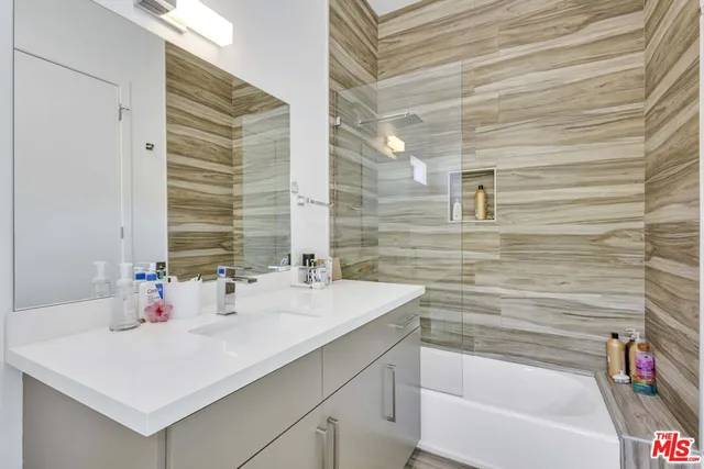 a bathroom with a sink and a bathtub