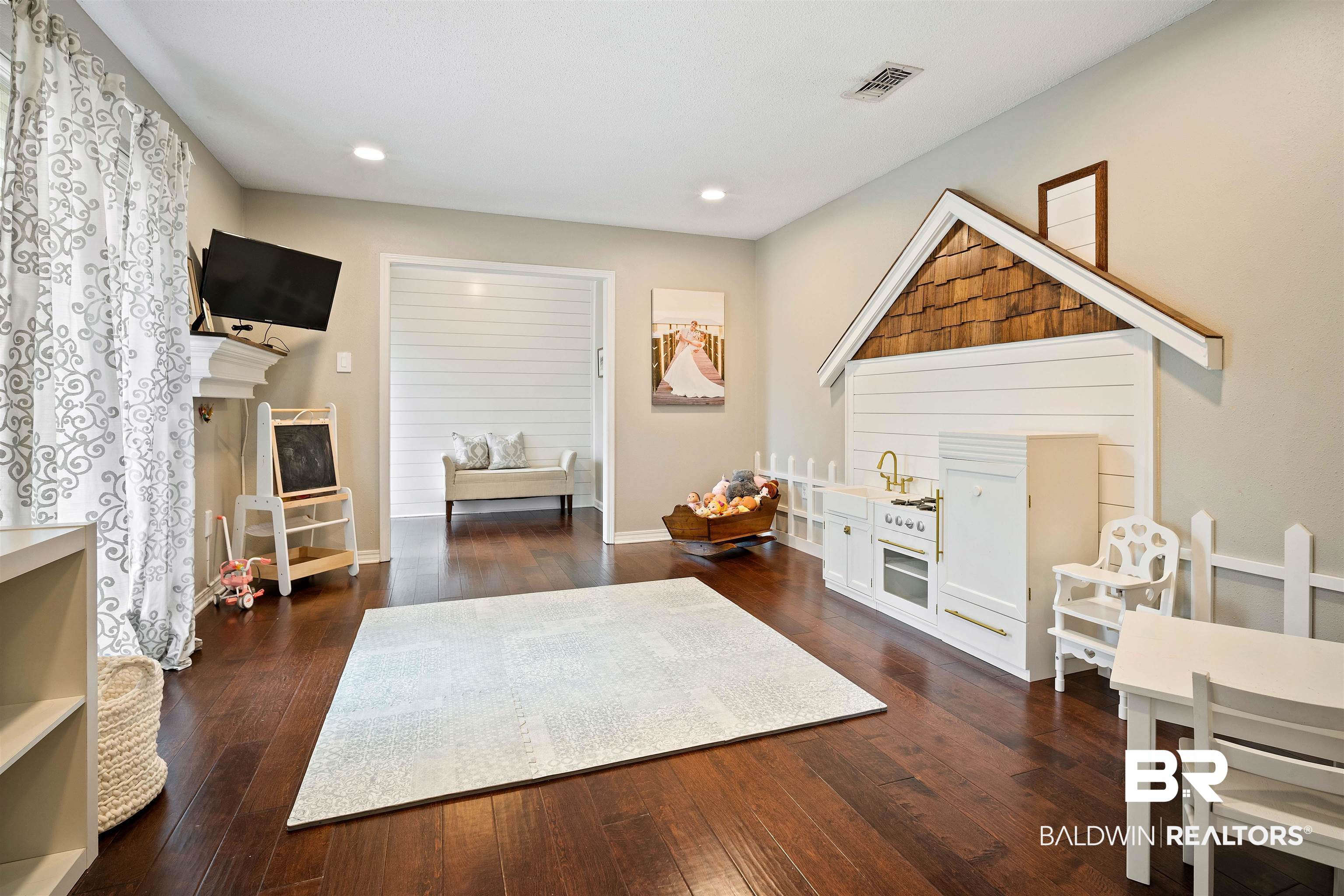 4228 Spring Valley Drive South Mobile, AL 36693 - Photo 15 of 31 Interior space with a fireplace and dark hardwood / wood-style flooring