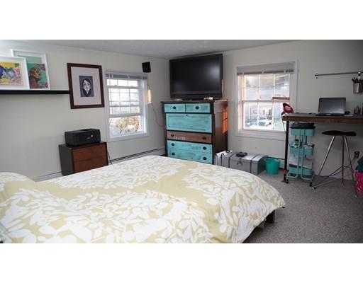 20 Milton Street Saugus, MA 01906 - Photo 12 of 30 a bedroom with a bed and a television in it