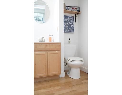 20 Milton Street Saugus, MA 01906 - Photo 18 of 30 a bathroom with a toilet a sink and mirror