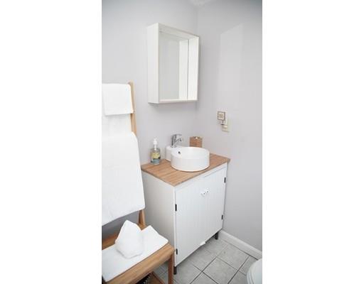 20 Milton Street Saugus, MA 01906 - Photo 19 of 30 a bathroom with a sink a toilet and vanity