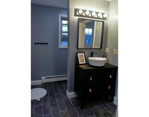20 Milton Street Saugus, MA 01906 - Photo 20 of 30 a bathroom with a sink and a mirror