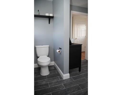 20 Milton Street Saugus, MA 01906 - Photo 21 of 30 a bathroom with a toilet and a vanity