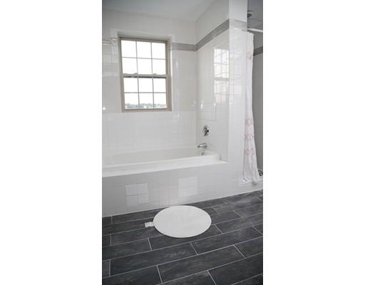 20 Milton Street Saugus, MA 01906 - Photo 22 of 30 a bathroom with a granite countertop bathtub and sink