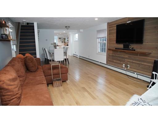 20 Milton Street Saugus, MA 01906 - Photo 3 of 30 a living room with furniture and a flat screen tv