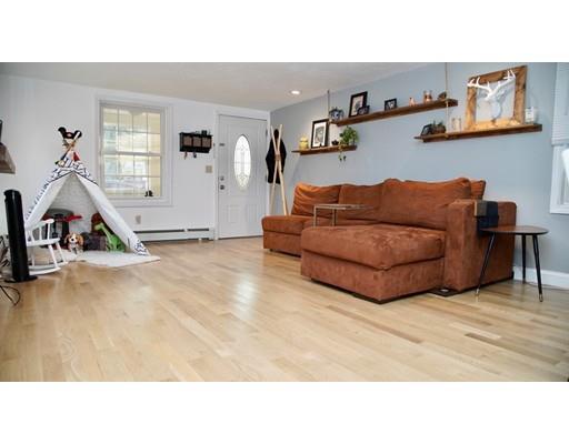 20 Milton Street Saugus, MA 01906 - Photo 4 of 30 a living room with furniture window and gym equipment