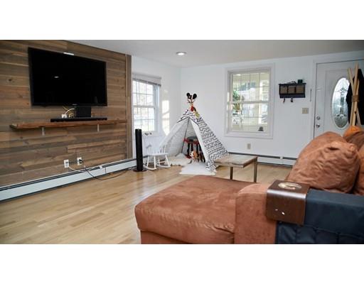 20 Milton Street Saugus, MA 01906 - Photo 5 of 30 a living room with furniture and a flat screen tv
