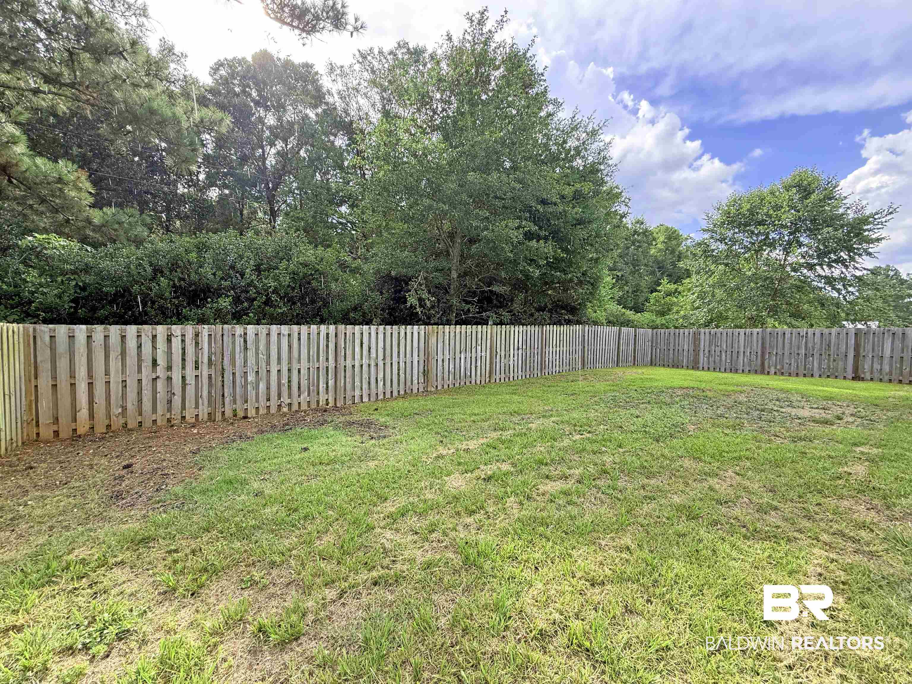 22023 Garland Loop Silverhill, AL 36576 - Photo 32 of 33 View of fenced backyard
