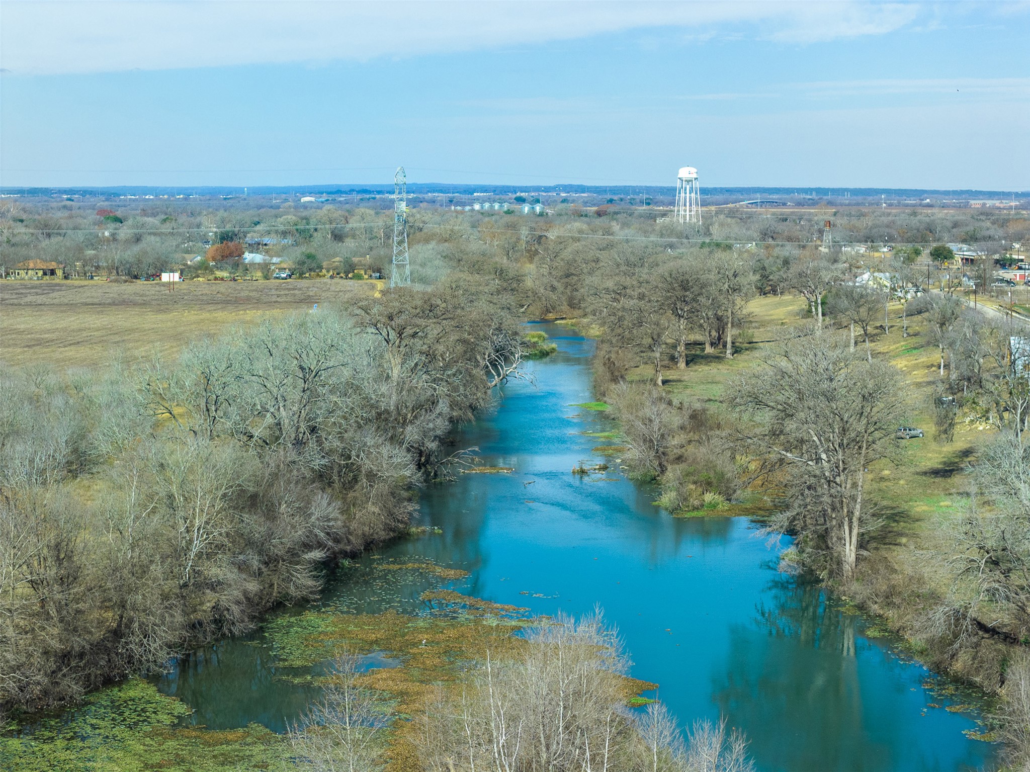 598 Northwest River Road Martindale, TX 78655 - Photo 1 of 11 Bird's eye view of a nearby body of water