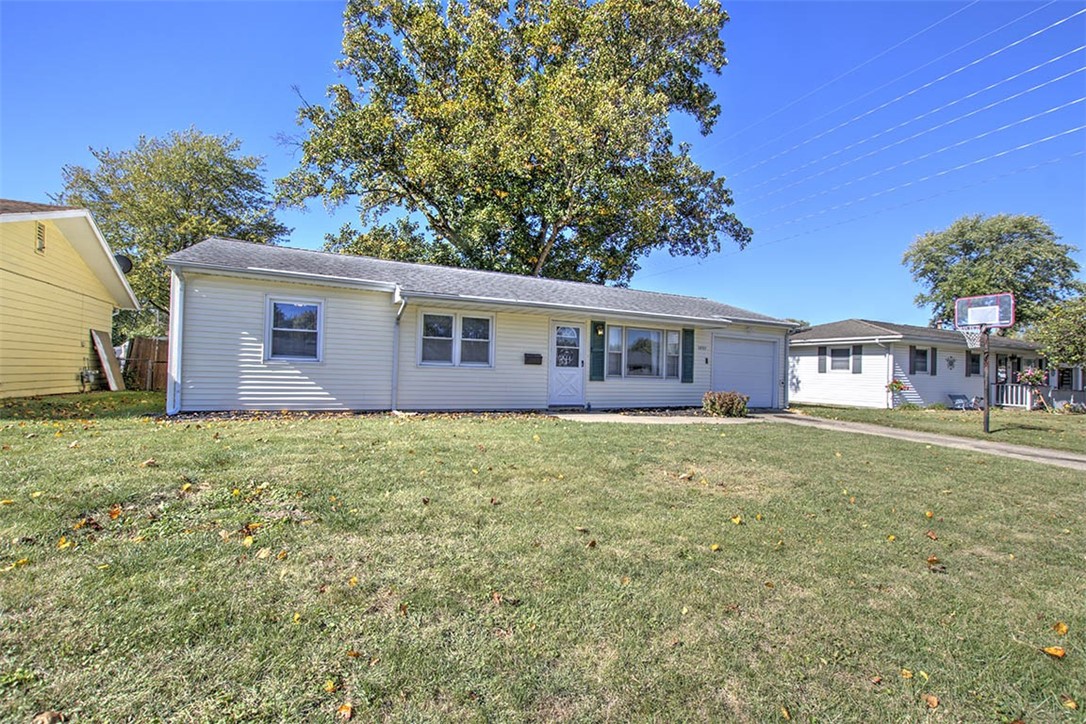 3959 Cambridge Drive Decatur, IL 62526 - Photo 5 of 20 Front of home plus basketball hoop